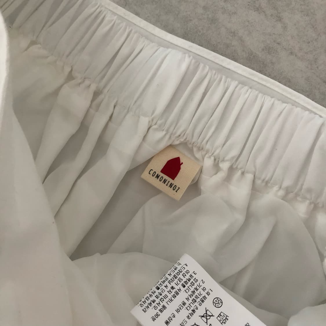 꼬모니노즈 뒷밴딩 리본 스트랩 미디 스커트 아이보리 free 상품이미지5