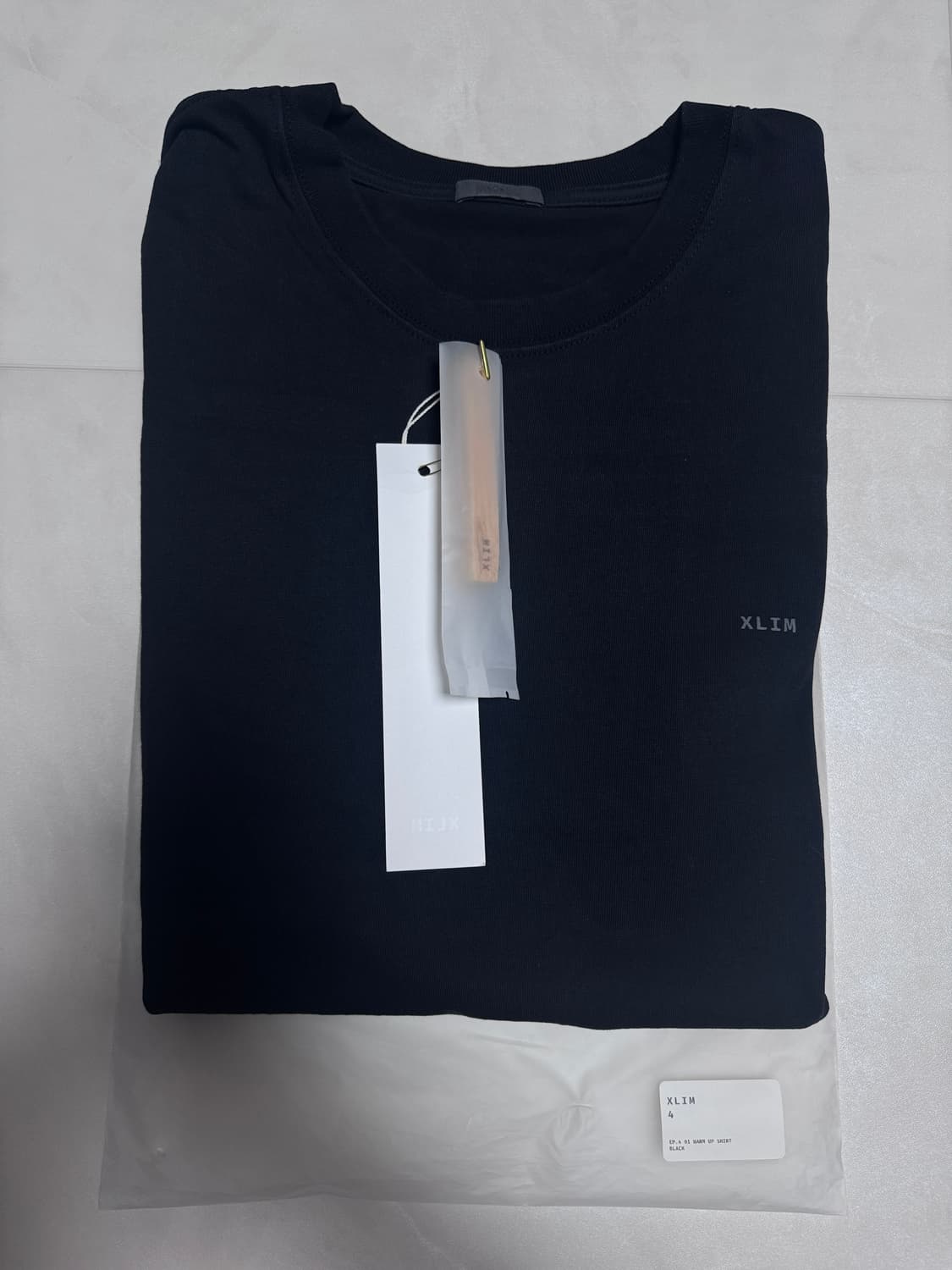 xlim ep.4 01 warm up shirt black 4 상품이미지1