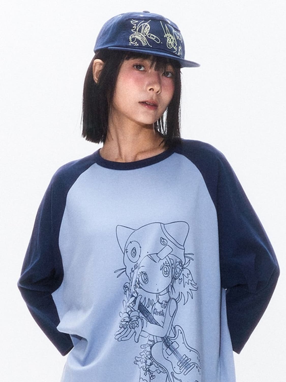 키르시 썬원버드 그래픽 래글런 롱 슬리브 네이비 상품이미지2