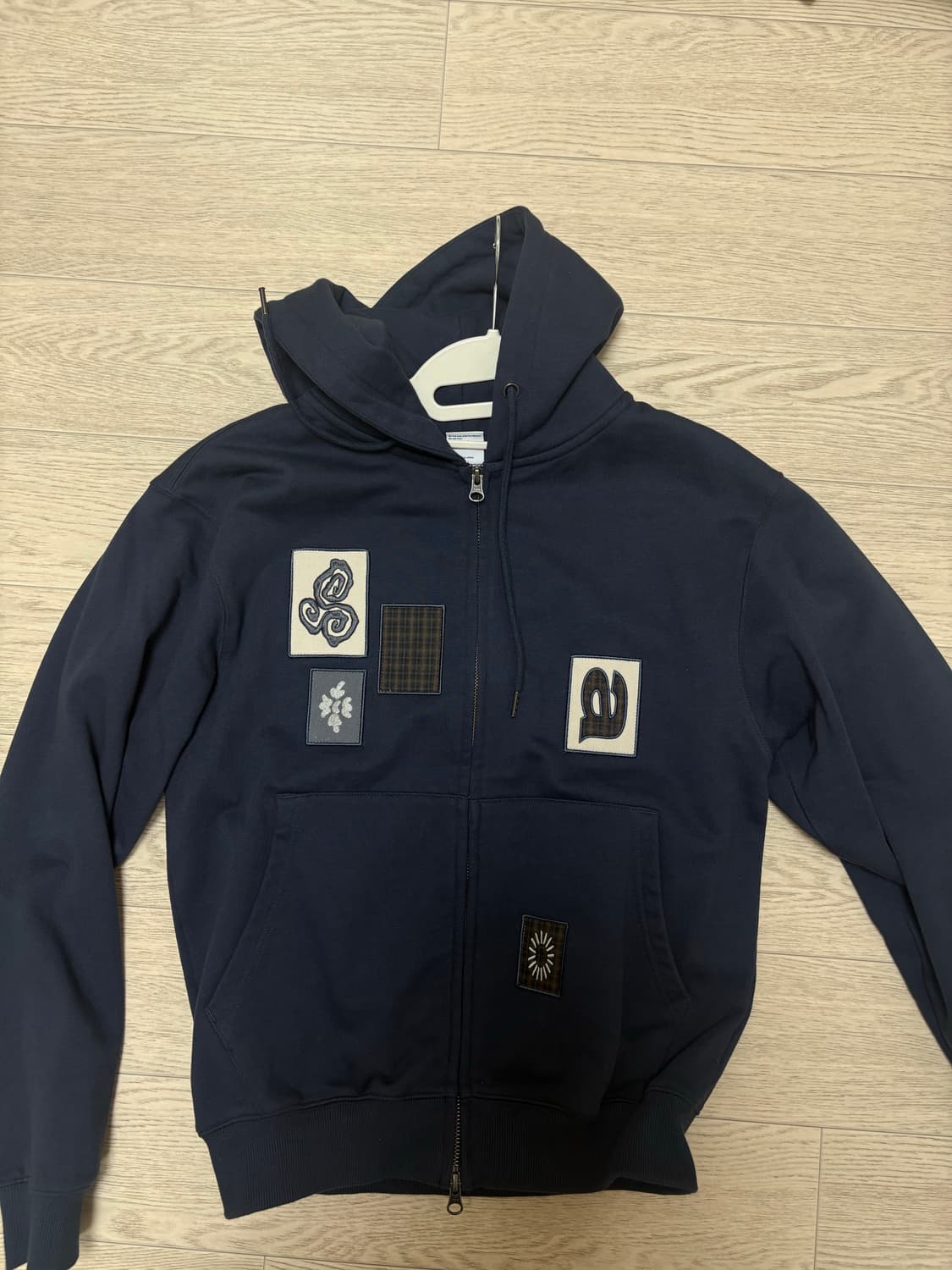 더콜디스트모먼트 후드집업 상품이미지1