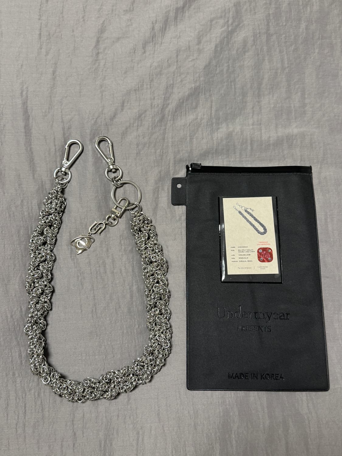 [OS] 언더마이카 리키에너스 체인 다운 블루 - 23SS 상품이미지1