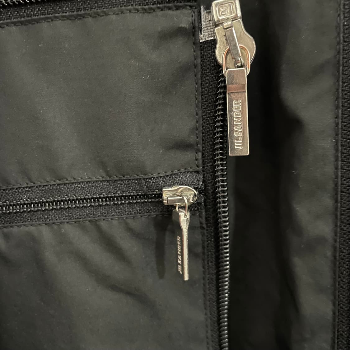 질샌더 포켓터블 원드브레이커 상품이미지7