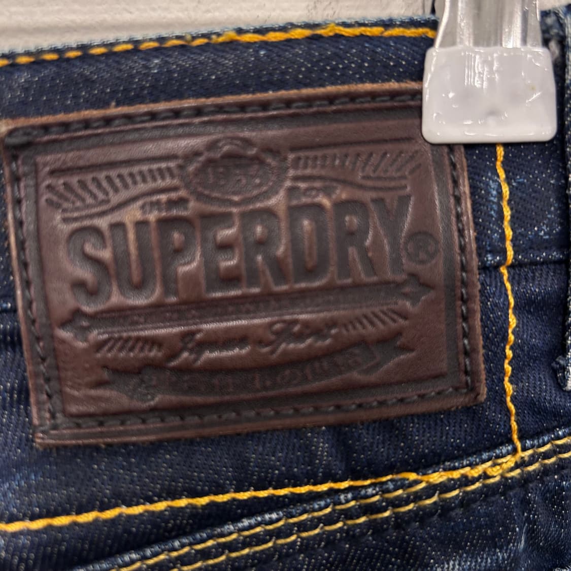 슈퍼드라이 재팬 슬림핏 버튼플라이 코팅 데님진 상품이미지6