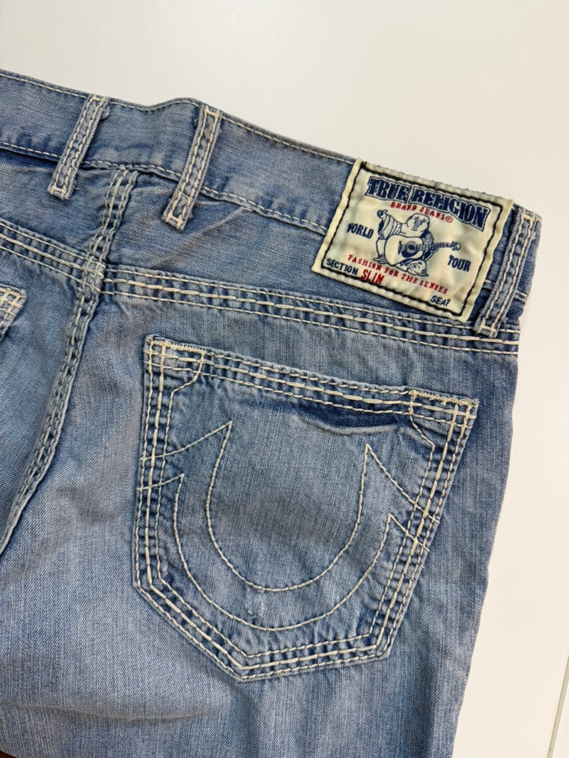 트루릴리젼 슬림 연청 데님 팬츠 상품이미지1