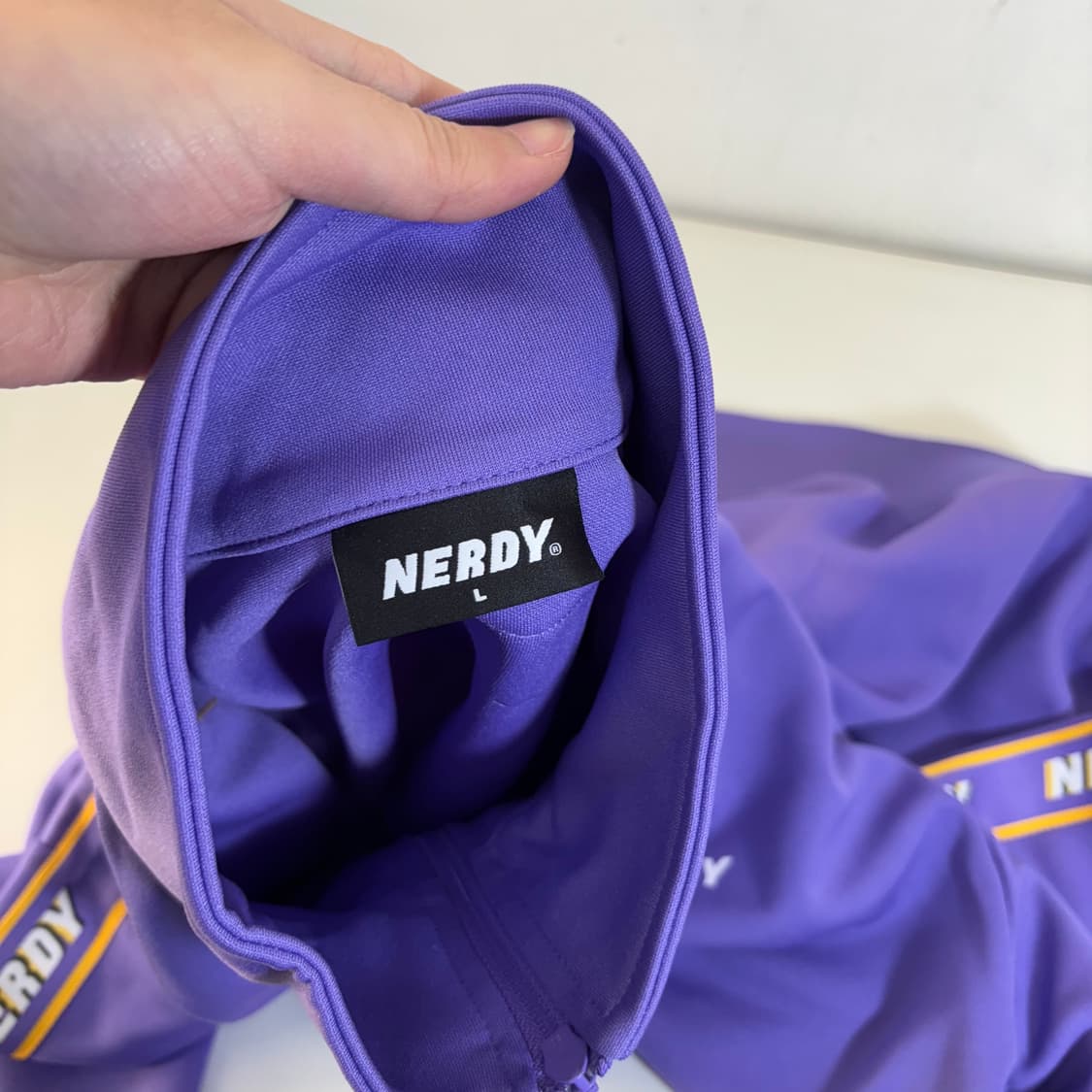 L 널디 파스텔퍼플 사이드로고 오버핏 트랙탑 집업져지 상품이미지4