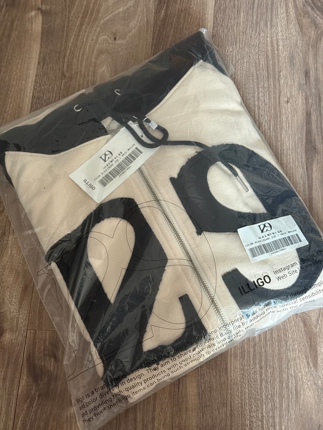 (새상품)  일리고 129 패치 후드 집업 블랙 크림 상품이미지1