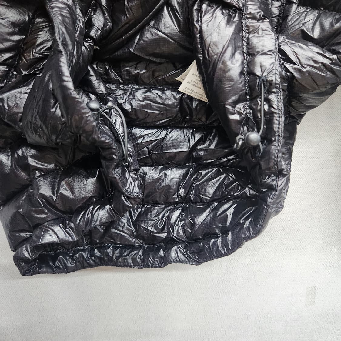 노스페이스 초 경량 구스다운 스트링 패딩 L 상품이미지4