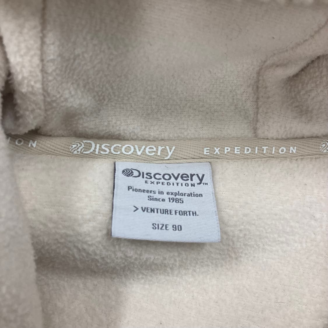 디스커버리 아이보리 컬러 스몰 로고 쉐르파 자켓 상품이미지4