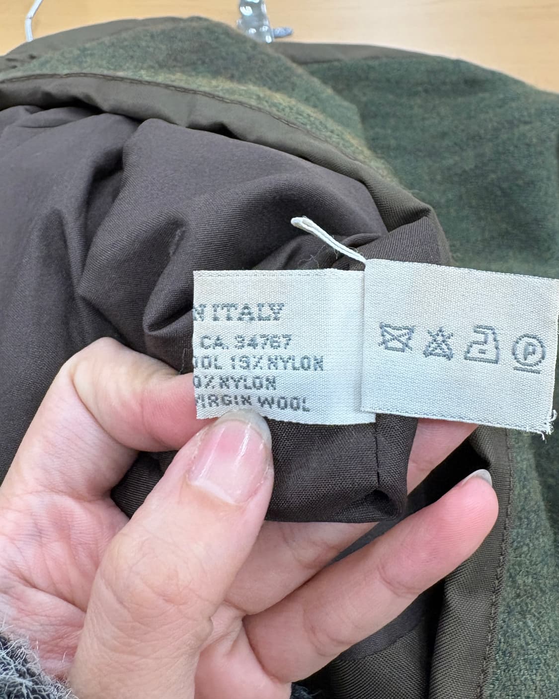 미우미우 카키 백 버클 미디 스커트 상품이미지9