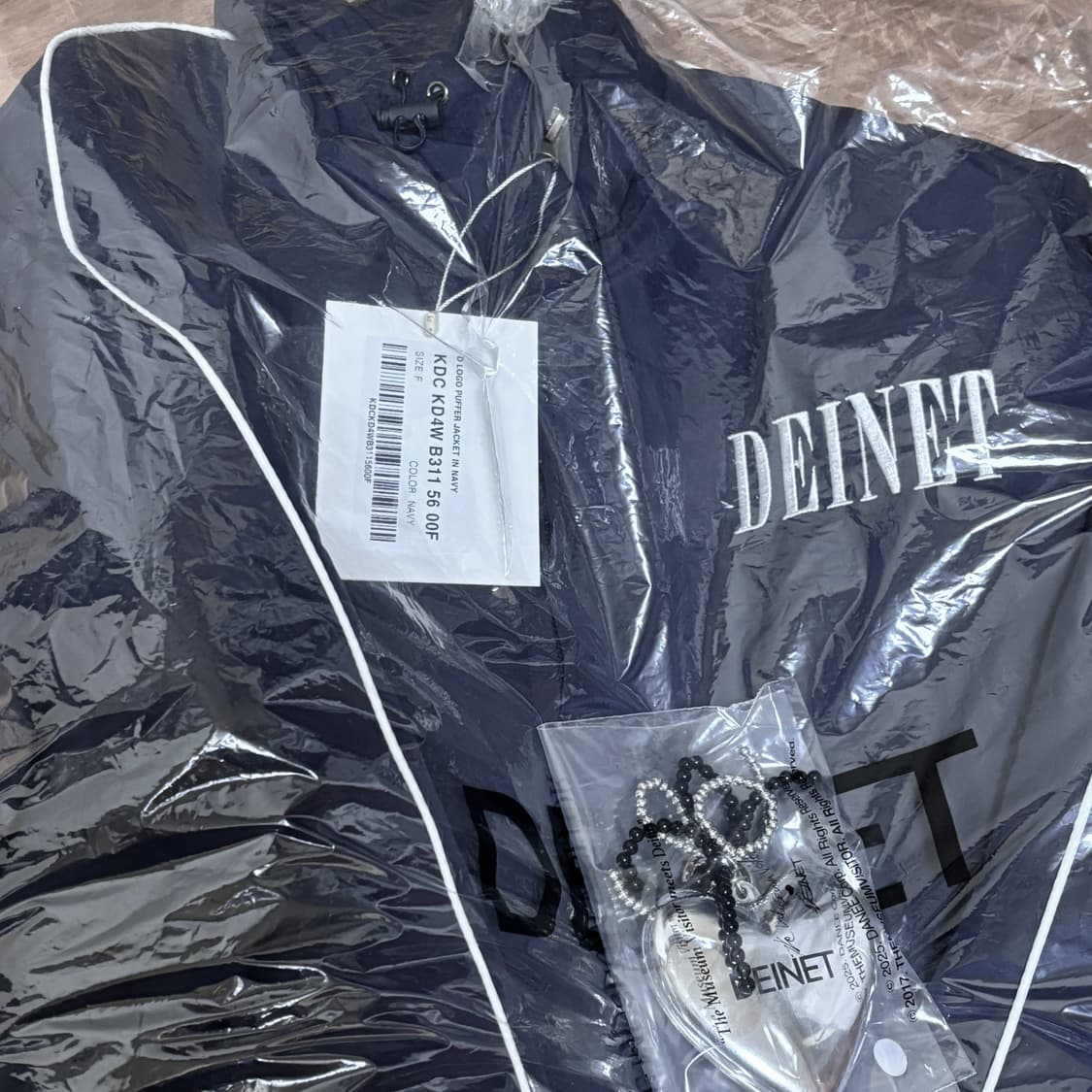 다이닛 로고 푸퍼 자켓 네이비 상품이미지10