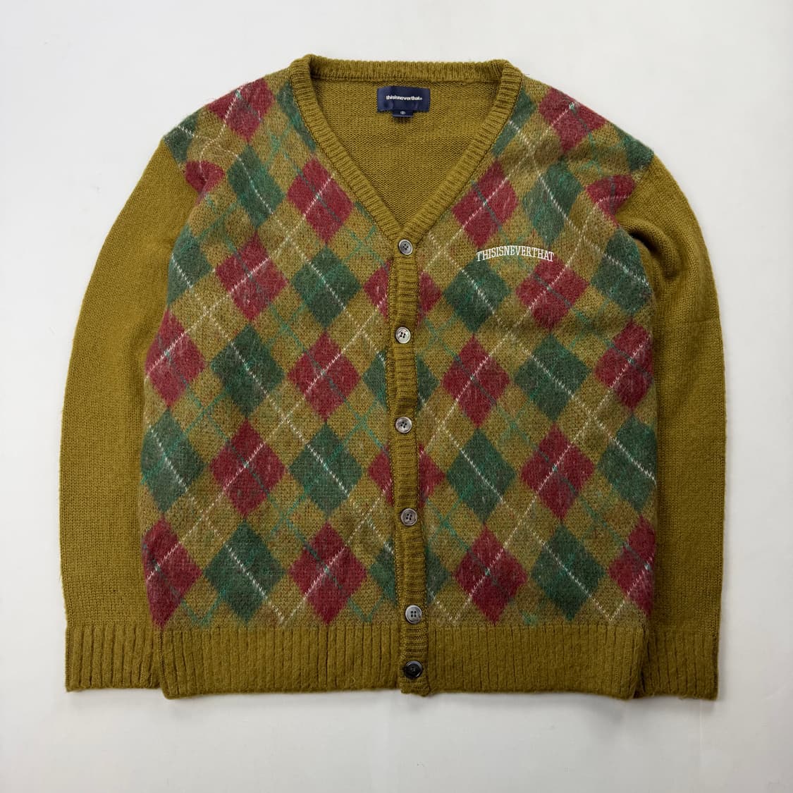 디스이즈네버댓 아가일패턴 니트 가디건 상품이미지1