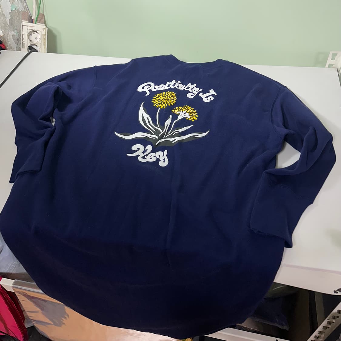 우먼M-L 유니클로 X 디즈니 네이비 오버핏 민들레프린팅 코튼원피스 상품이미지1