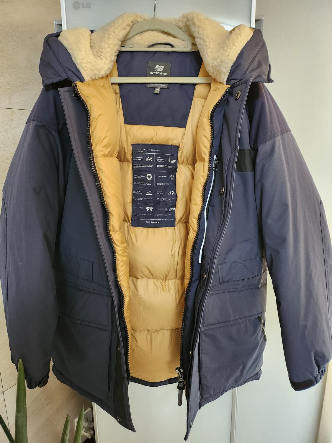 뉴발란스 카메라맨 덕다운 패딩 상품이미지4