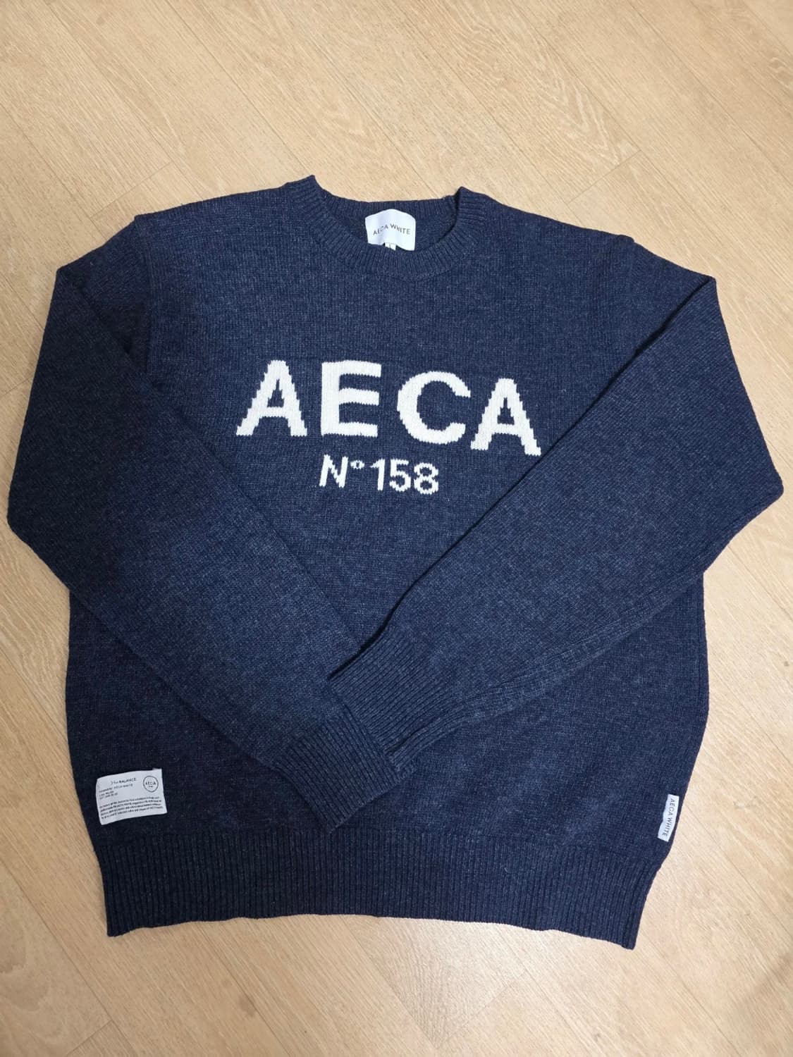 에이카화이트 빅로고 울니트 L 상품이미지1