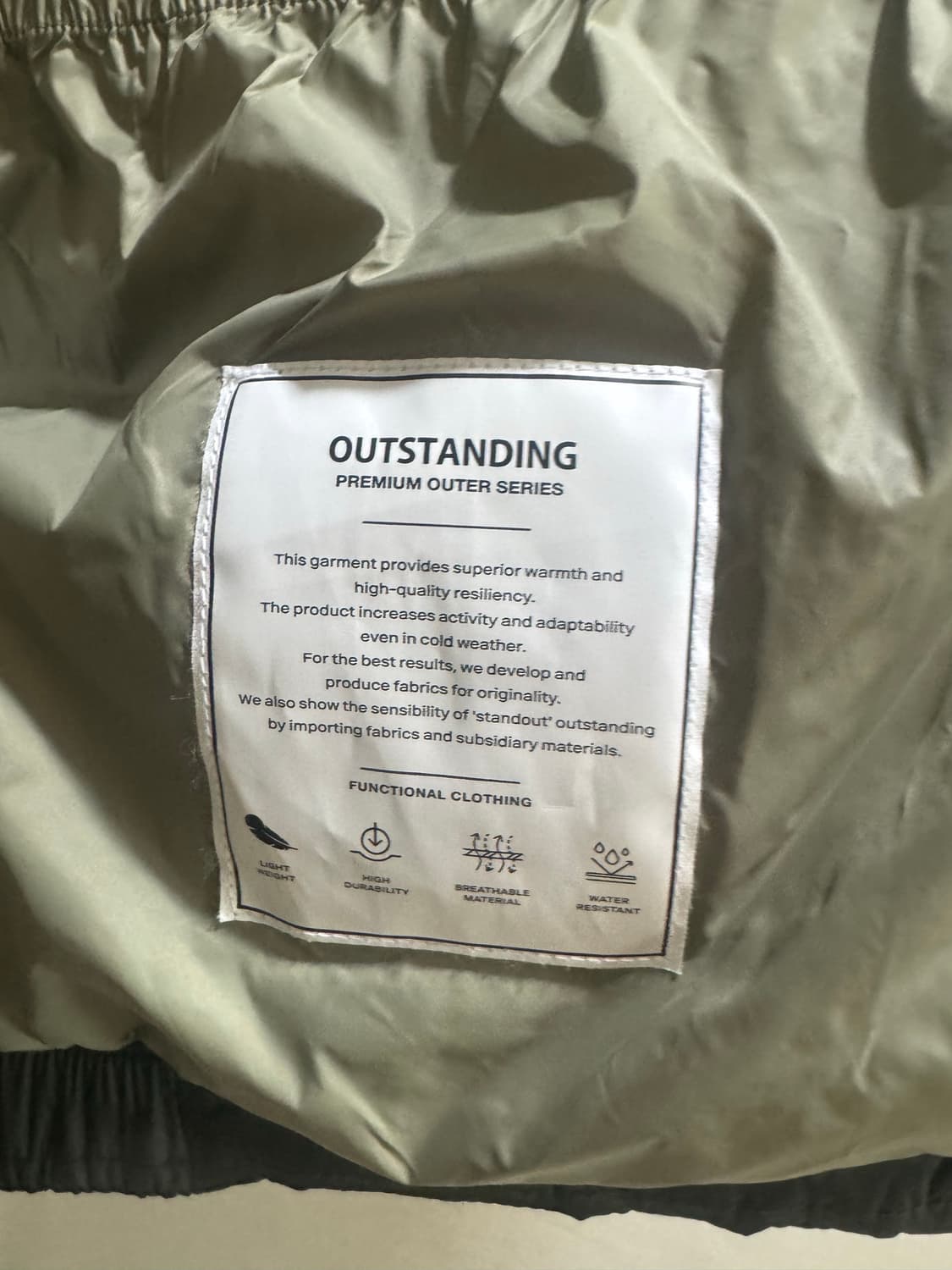 아웃스탠딩 카라코람 패딩 올리브 색상 상품이미지3