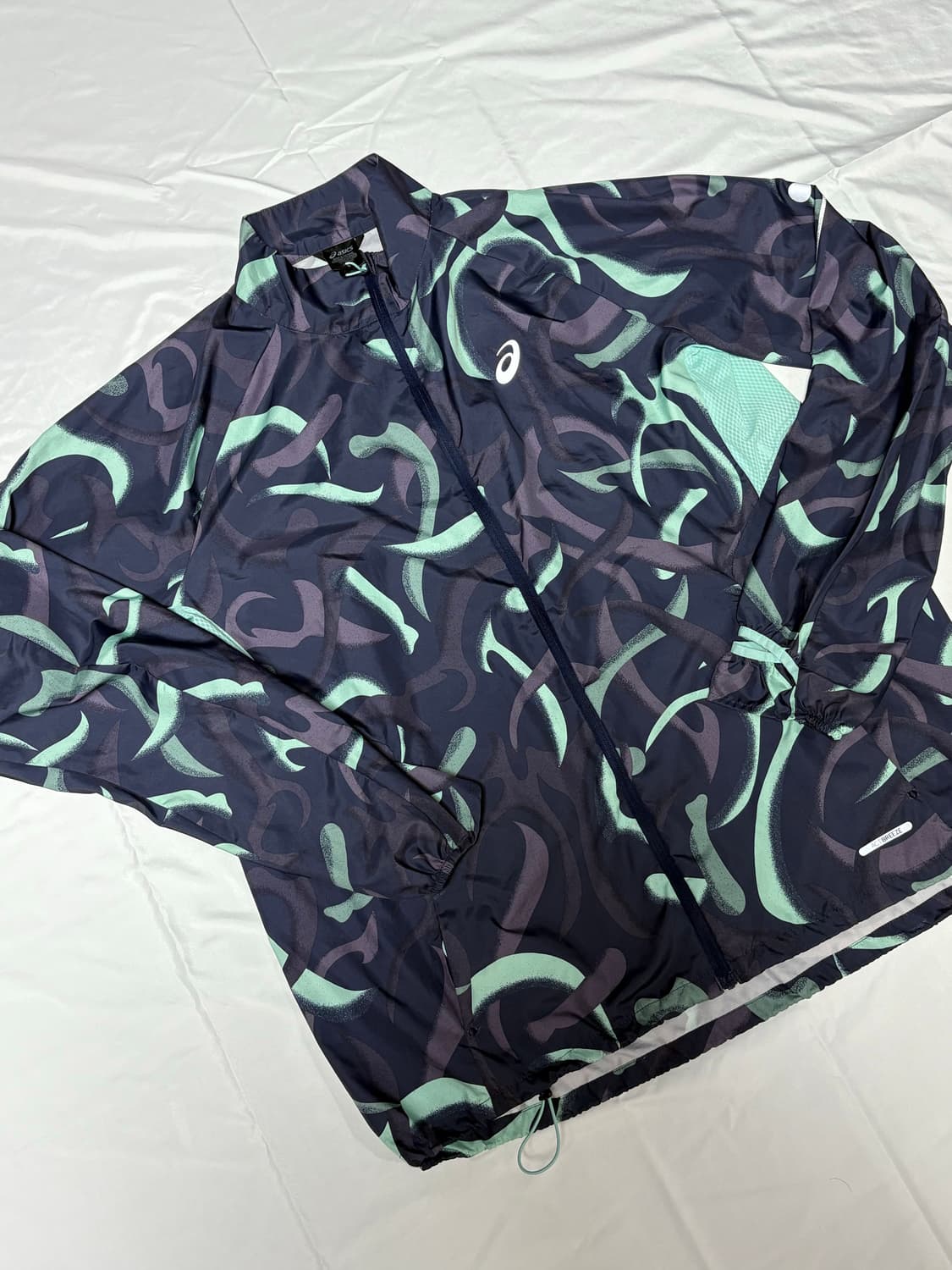 아식스 로드 라이트쇼 패커블 러닝 자켓 L 상품이미지1