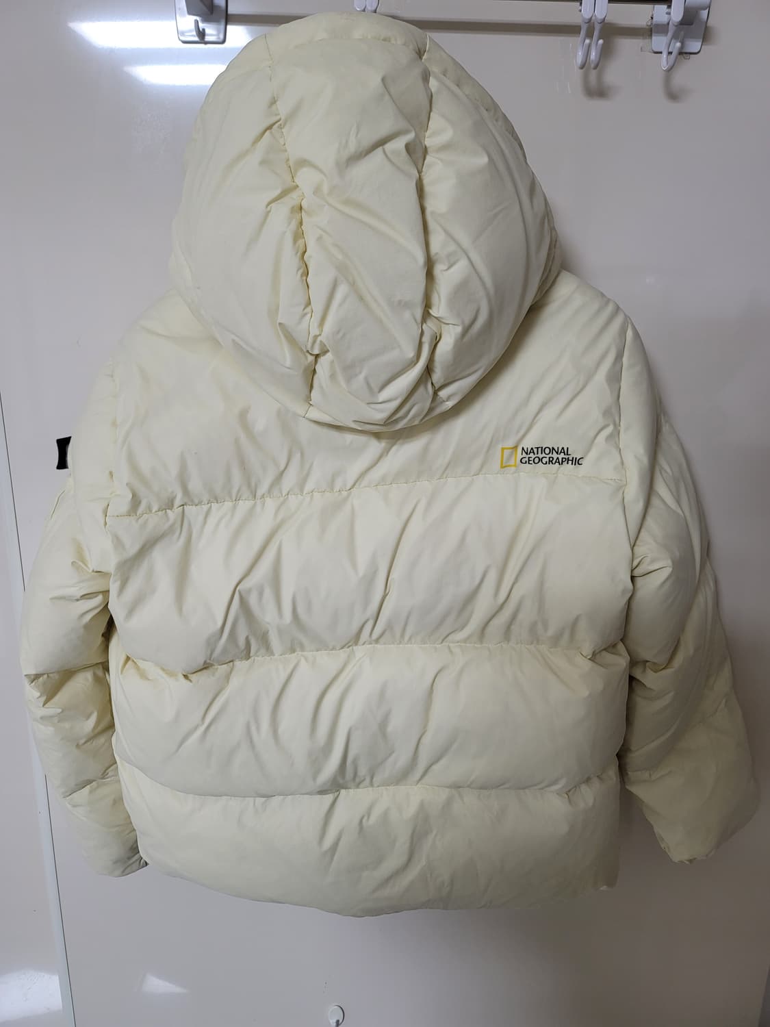 내셔널지오그래픽 구스다운패딩 아이보리 95사이즈 상태굿 상품이미지2