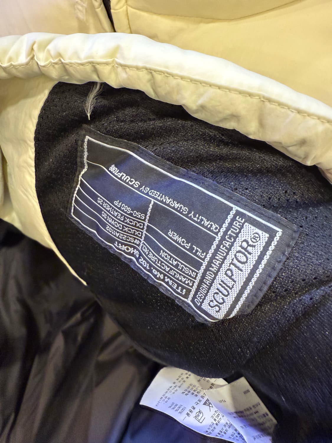 스컬프터 스포츠 자수로고 크림 숏패딩 상품이미지4