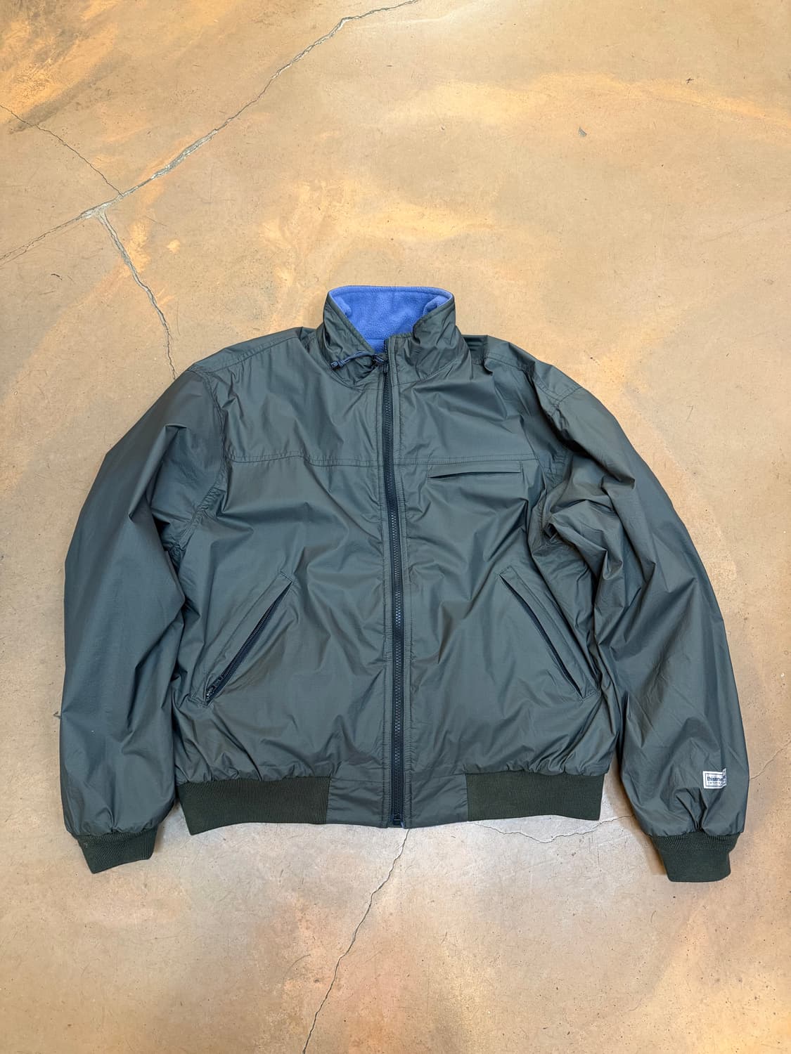 디스이즈네버뎃 리버시블 웜업 자켓 상품이미지1