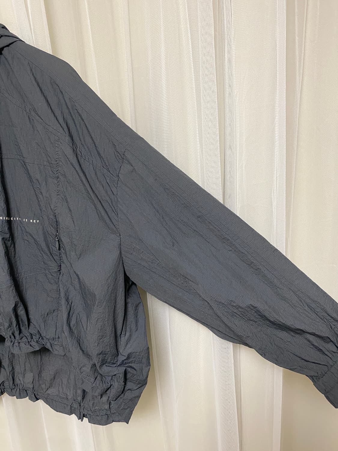 나이스클랍 나일론 아노락 지퍼 집업 셔링 스트링 후드 바람막이 점퍼 상품이미지3