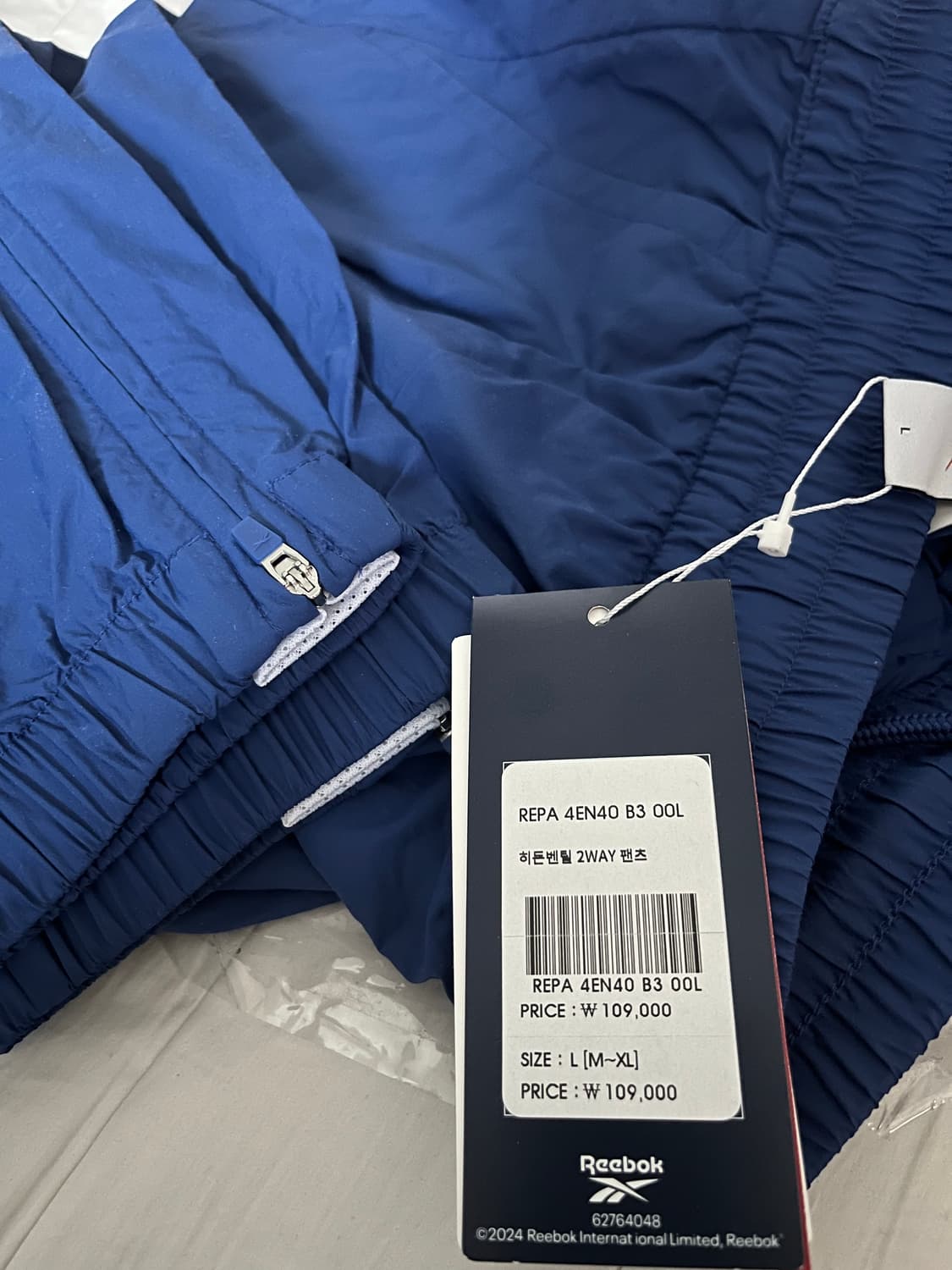 [L] 리복 히든 벤틸 2WAY 팬츠 블루 팔아요 상품이미지3