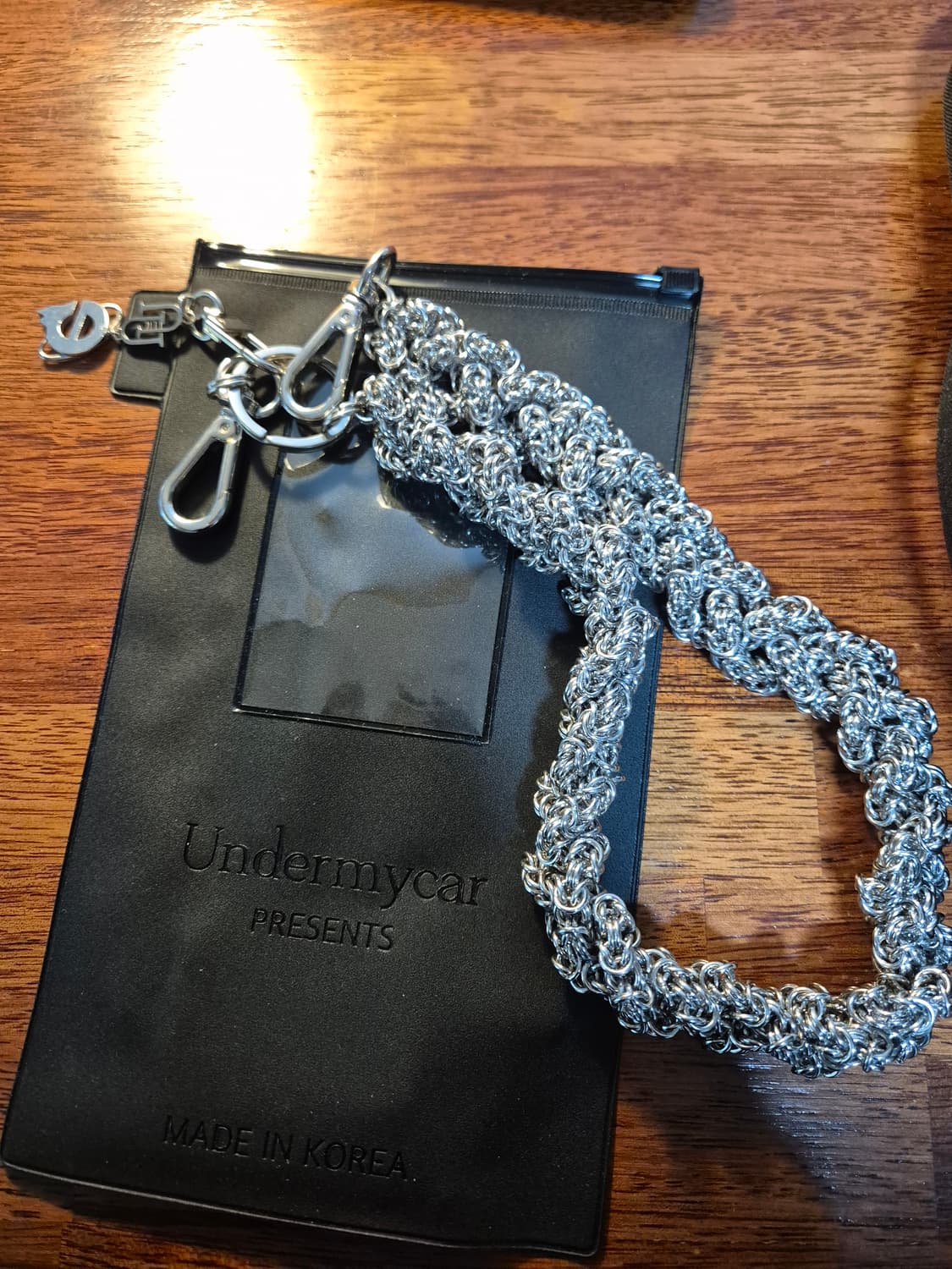 언더마이카 리키에너스 멀티플 탱글스 더블 로고 체인 다운 블루 - 23S 상품이미지1