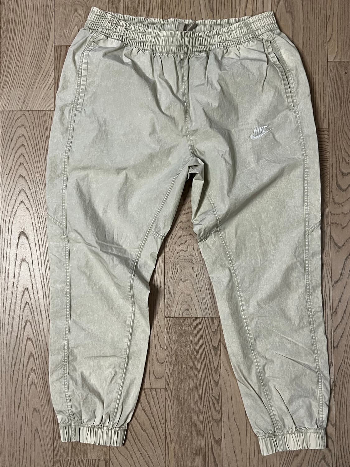 나이키 크림색 트랙팬츠 상품이미지1