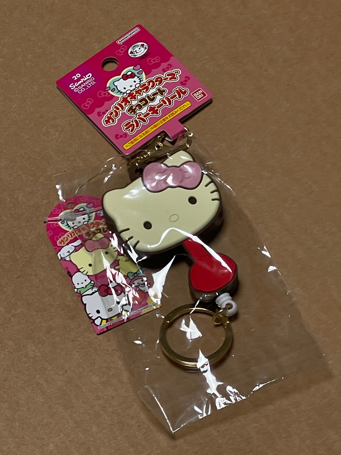 [새상품]산리오 헬로키티 초콜릿 모양 릴키링 상품이미지1