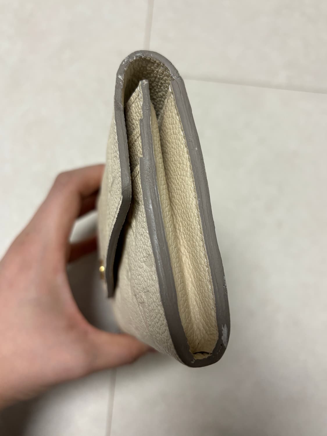 루이비통 모노그램 앙프렝뜨 아이보리 장지갑 상품이미지8