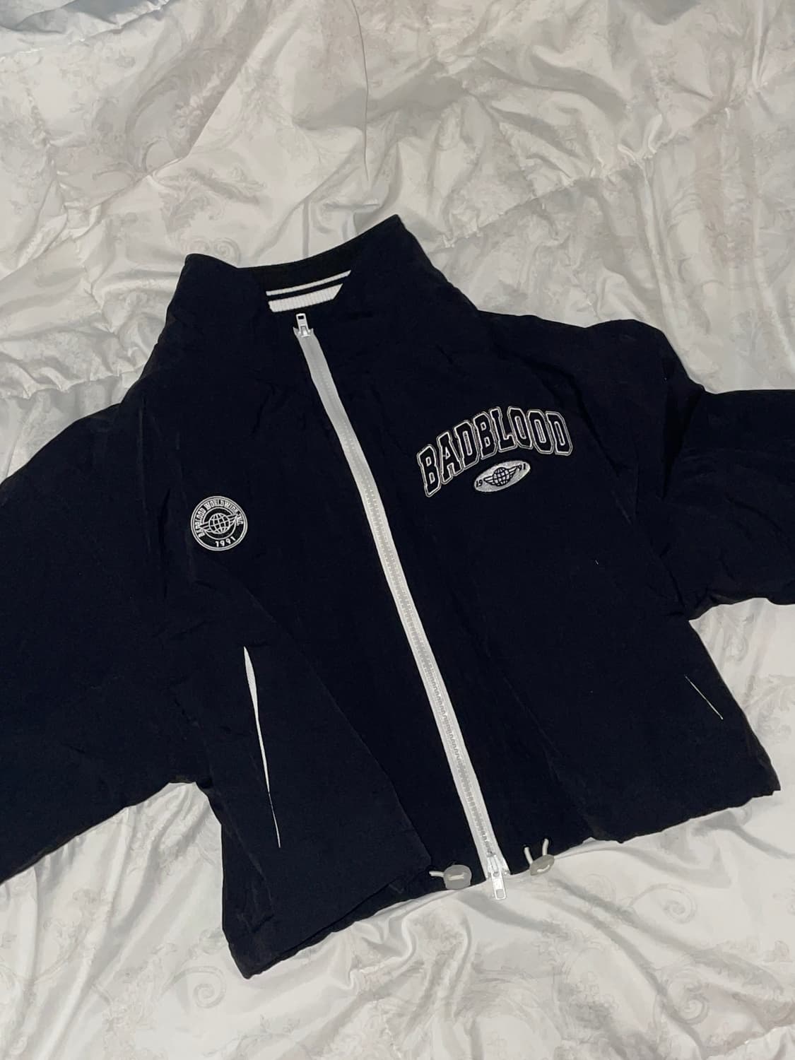 배드블러드 크롭 바람막이 후드집업 상품이미지1