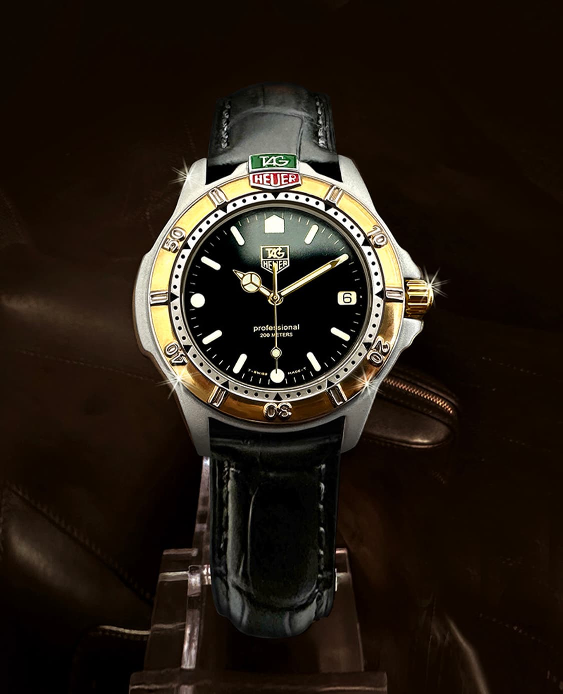 태그호이어 빈티지 프로패셔널 200M  블랙판 남성 콤비 시계 상품이미지1