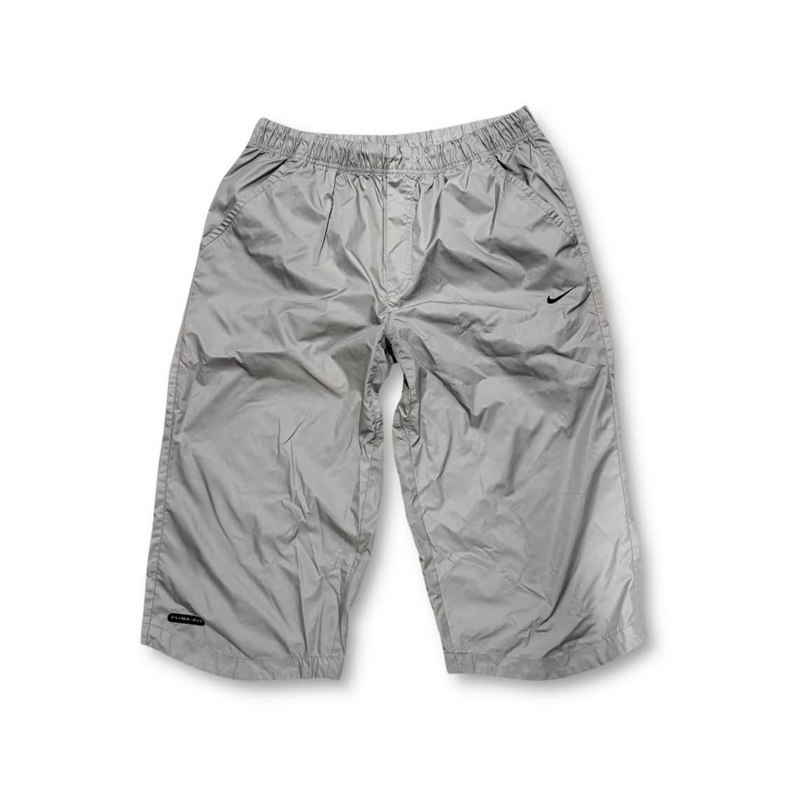 나이키 솔로 스우시 트랙 팬츠7부 상품이미지1