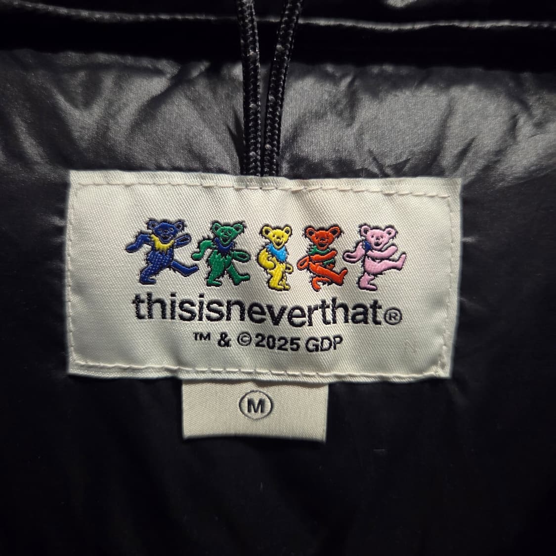 25년8월산 디스이즈네버댓 GD Light Down 패딩 블랙 M 상품이미지3