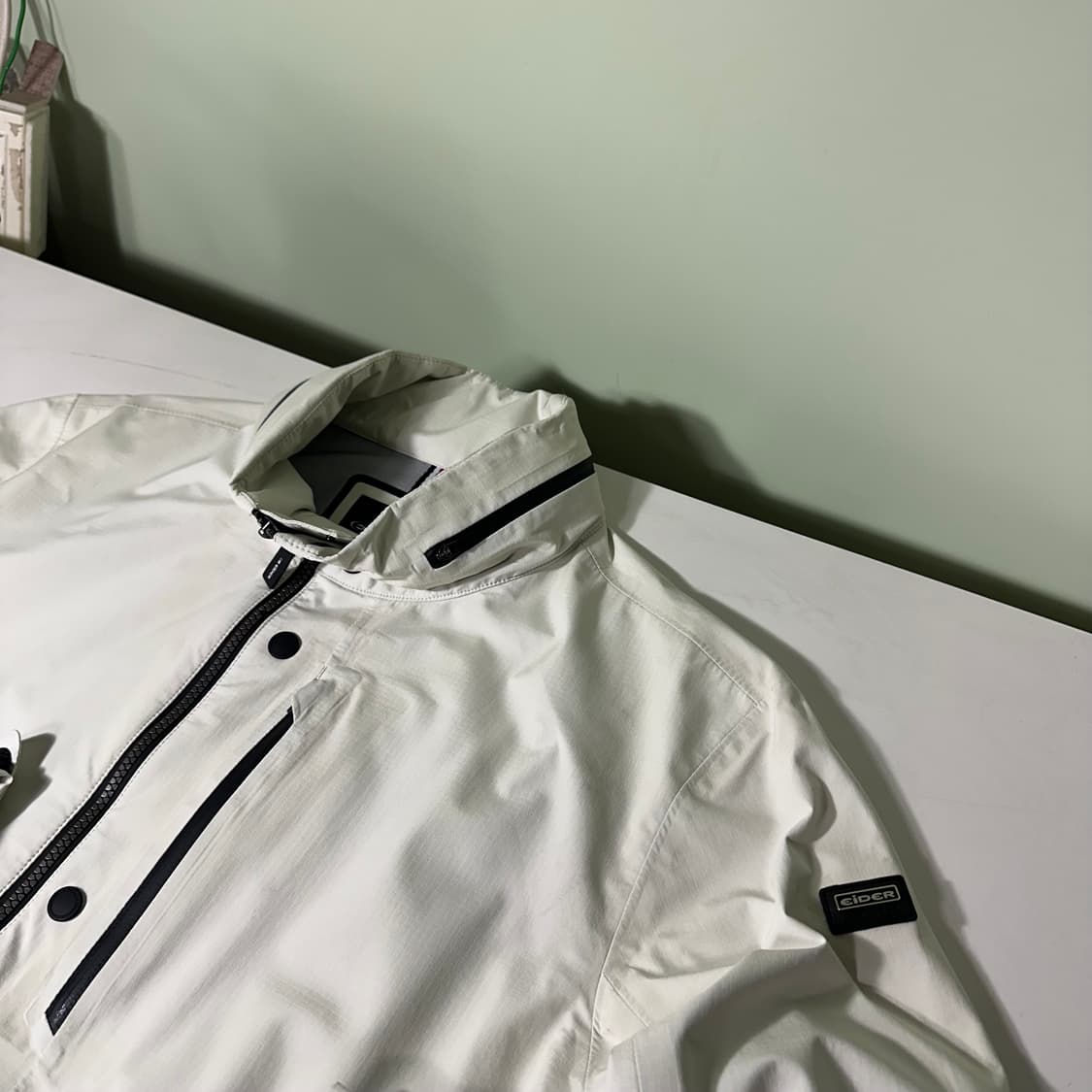 M-L 아이더 크림아이보리 허리스트링 히든후드 나일론자켓 상품이미지2