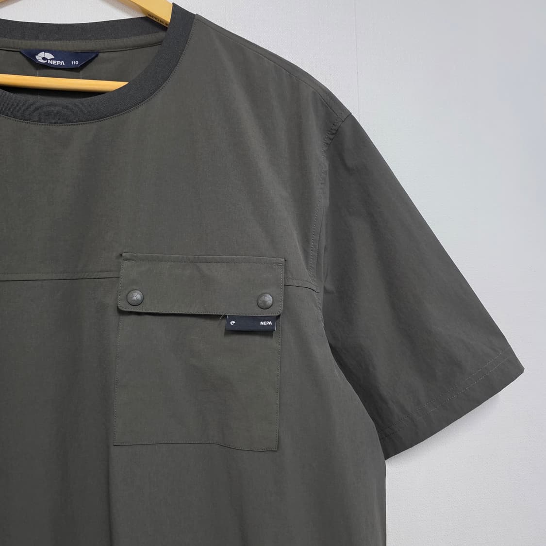 110 네파 우븐 반팔 웜업 바람막이 상품이미지3