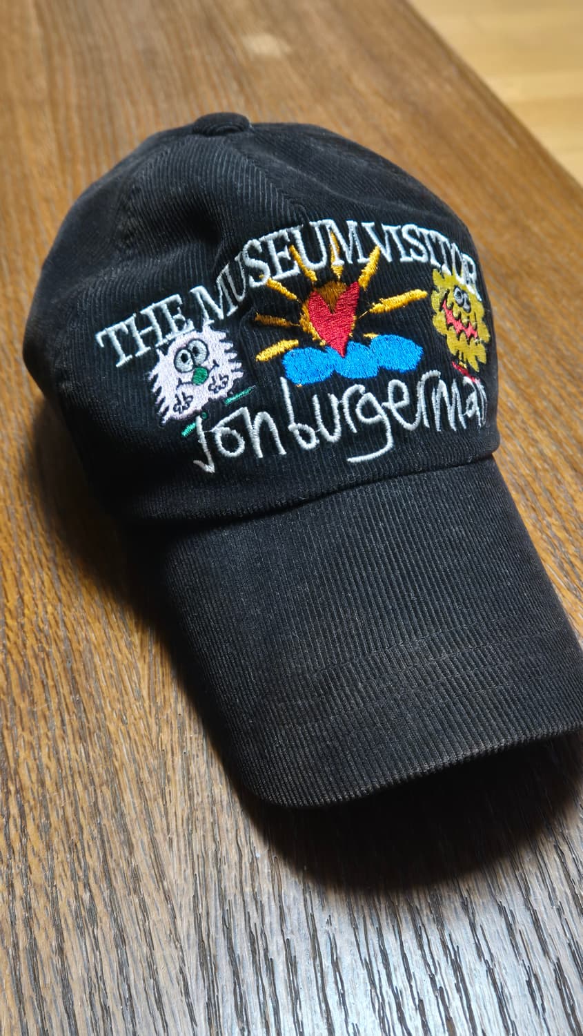 더뮤지엄비지터 존버거맨 모자 상품이미지1