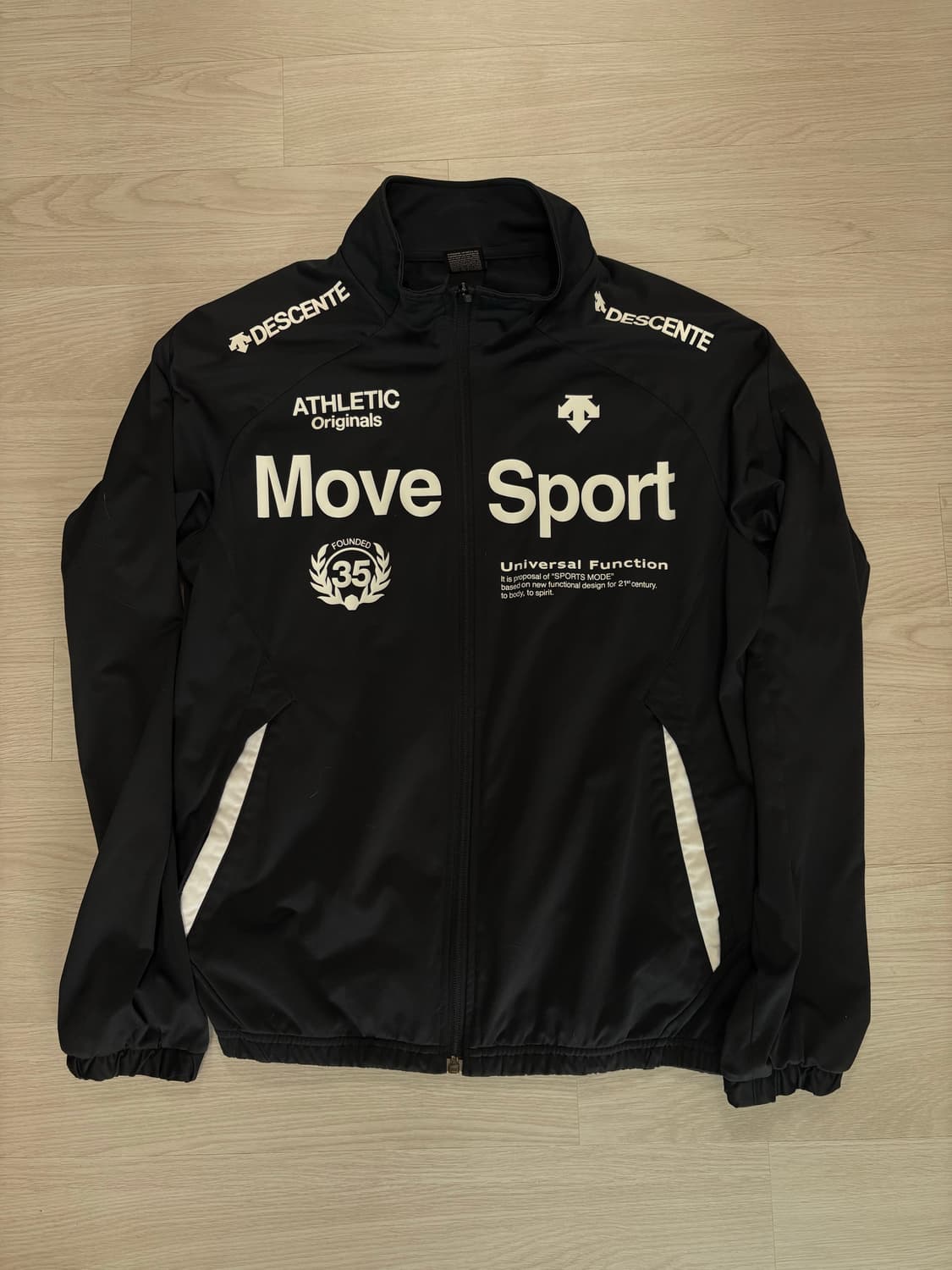 데상트 집업 상품이미지1