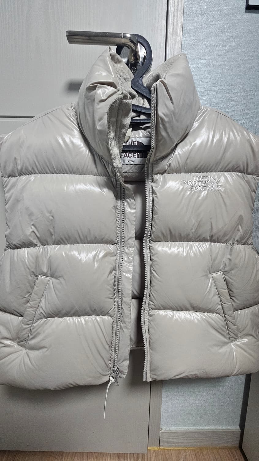 노스페이스 여성 패딩 조끼 아이보리 상품이미지1