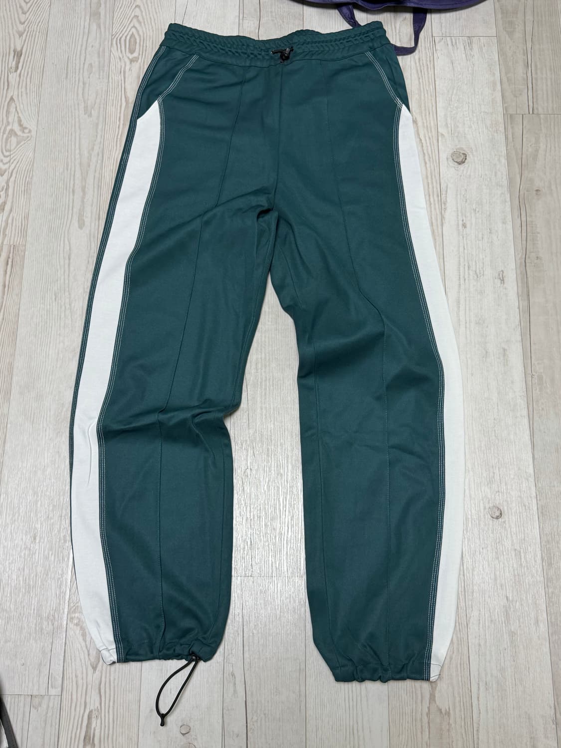 리오버 트랙팬츠 상품이미지1