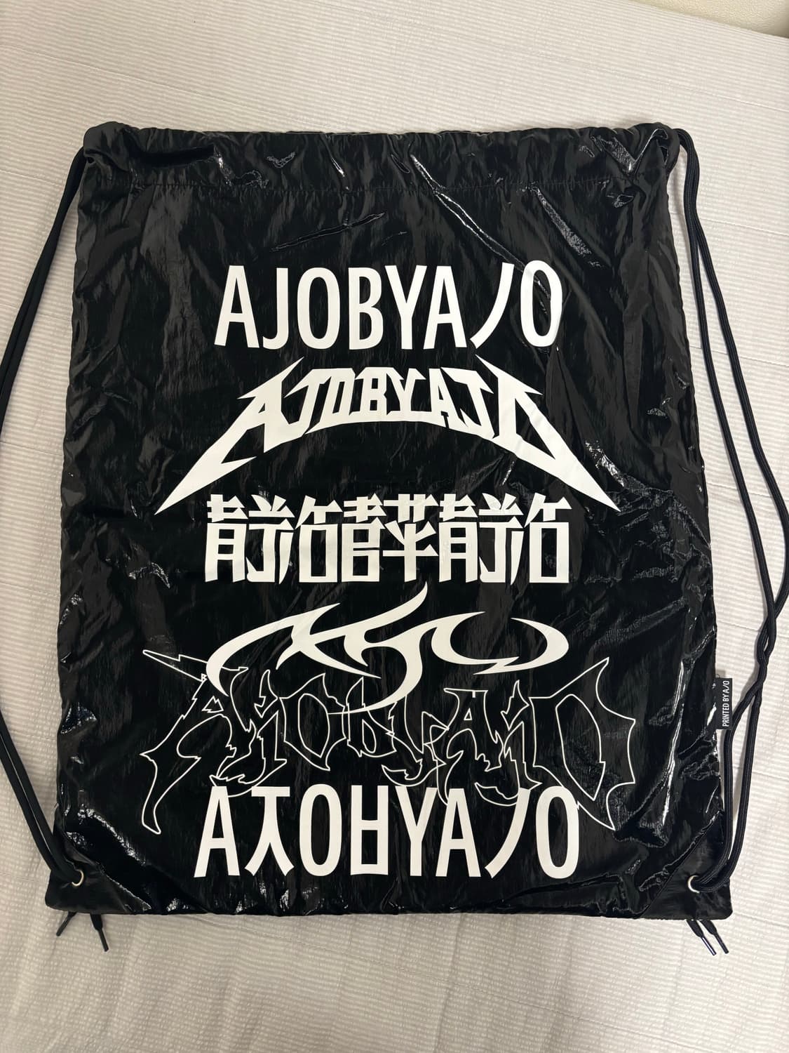 아조바이아조 토탈 로고 메탈 드로우스트링 백 블랙 상품이미지2