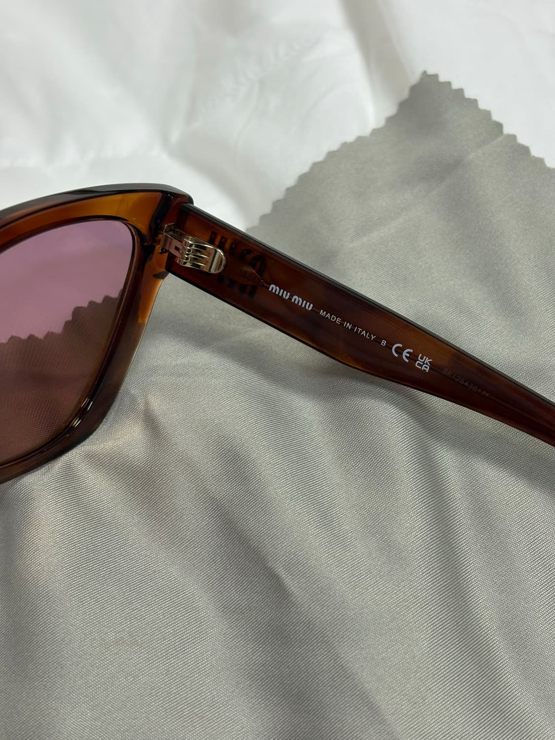 미우미우 선글라스 OMU 02ZS11Q50D 면세점 구매 상품이미지10