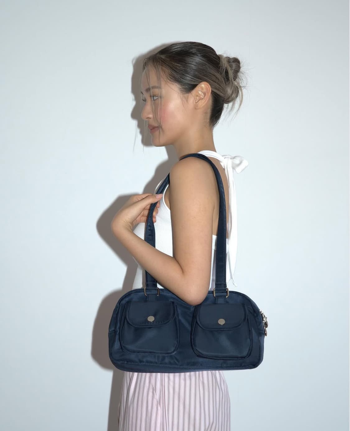 큘 포켓백 네이비 상품이미지1