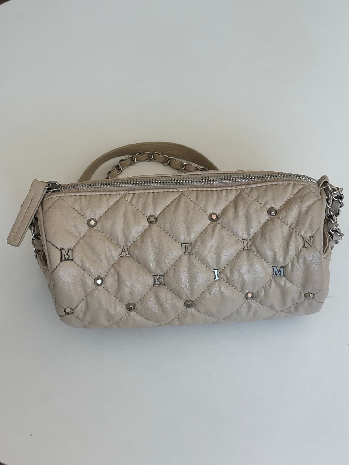 마뗑킴 스터드 실린더 퀼팅백  상품이미지1