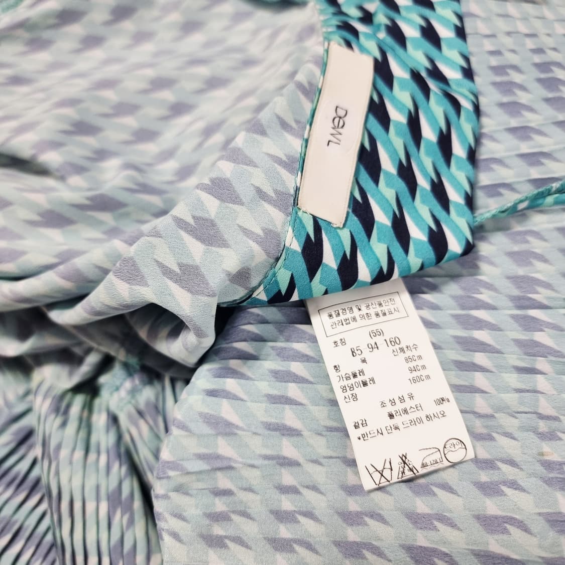 듀엘 DEWL 리본타이 플리츠 패턴 원피스 (55) 상태완벽 상품이미지9