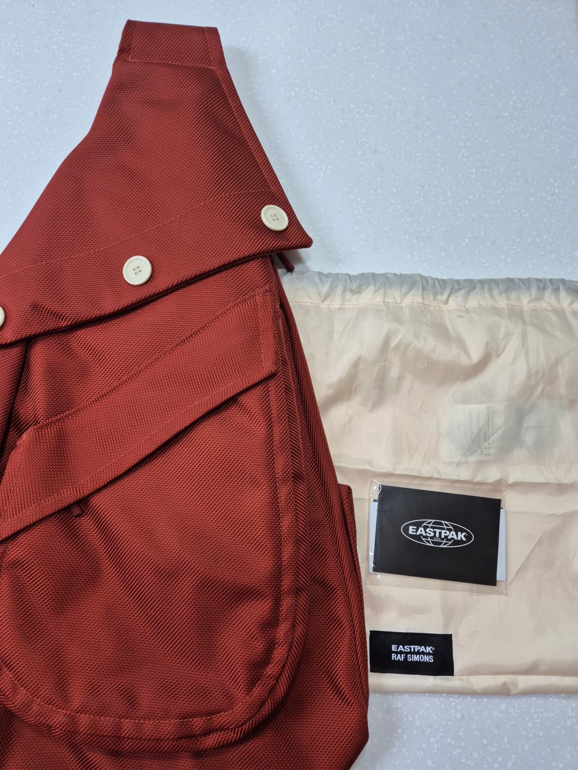 라프시몬스 이스트팩 슬링백 상품이미지1