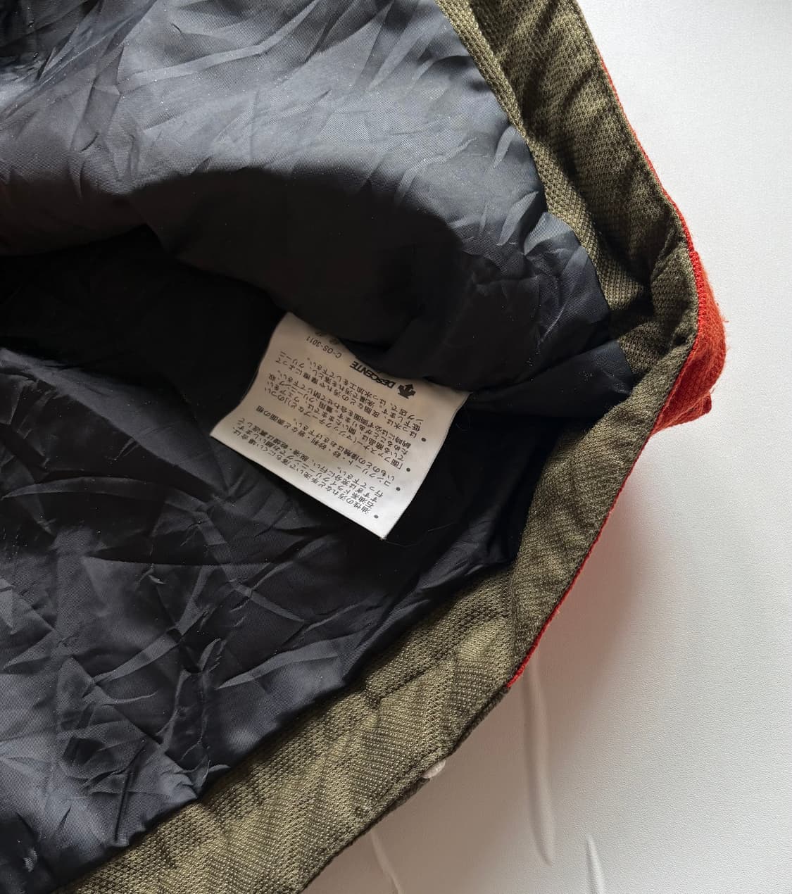 데상트 오버핏 카키 바람막이 상품이미지6