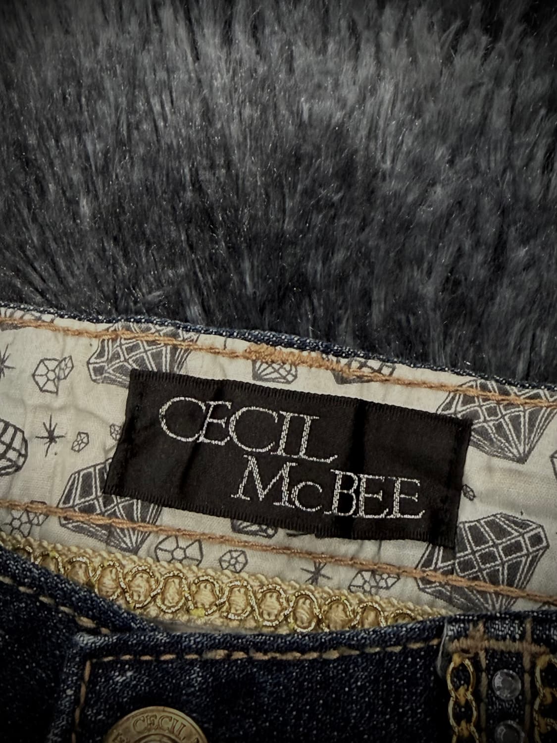 Cecil McBee 금장 큐빅 디테일 스키니진 상품이미지9