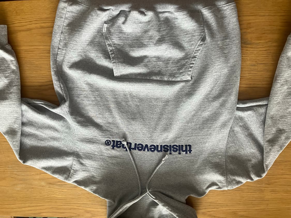 디스이즈네버뎃 회색 후드티 상품이미지1