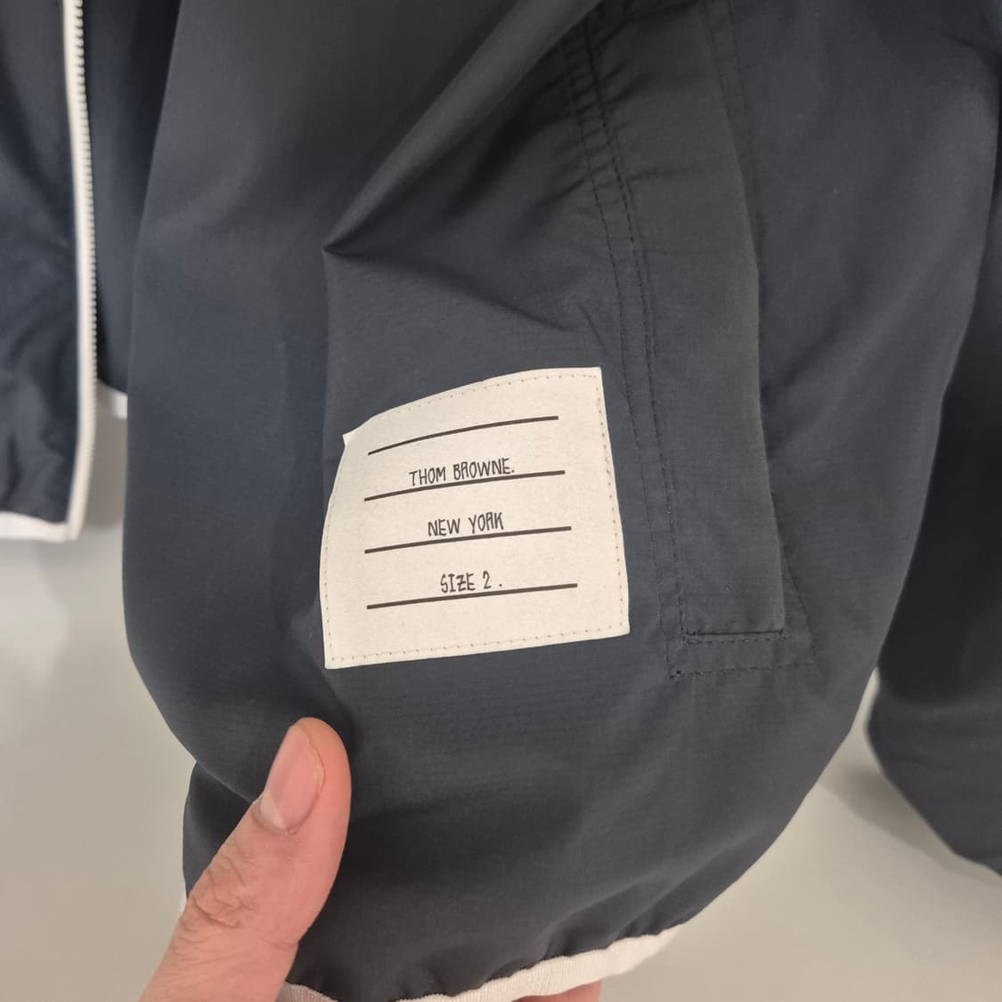 신품급 톰브라운 립스탑 신형 바람막이 2사이즈 상품이미지5