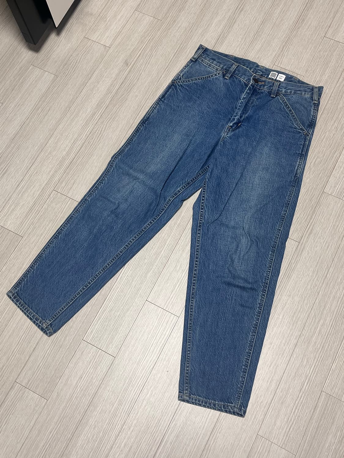 유니클로U 와이드핏 테이퍼드 데님 중청 29사이즈 상품이미지1